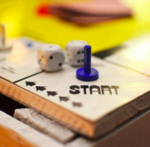 game board with 2 dice and the word "start"