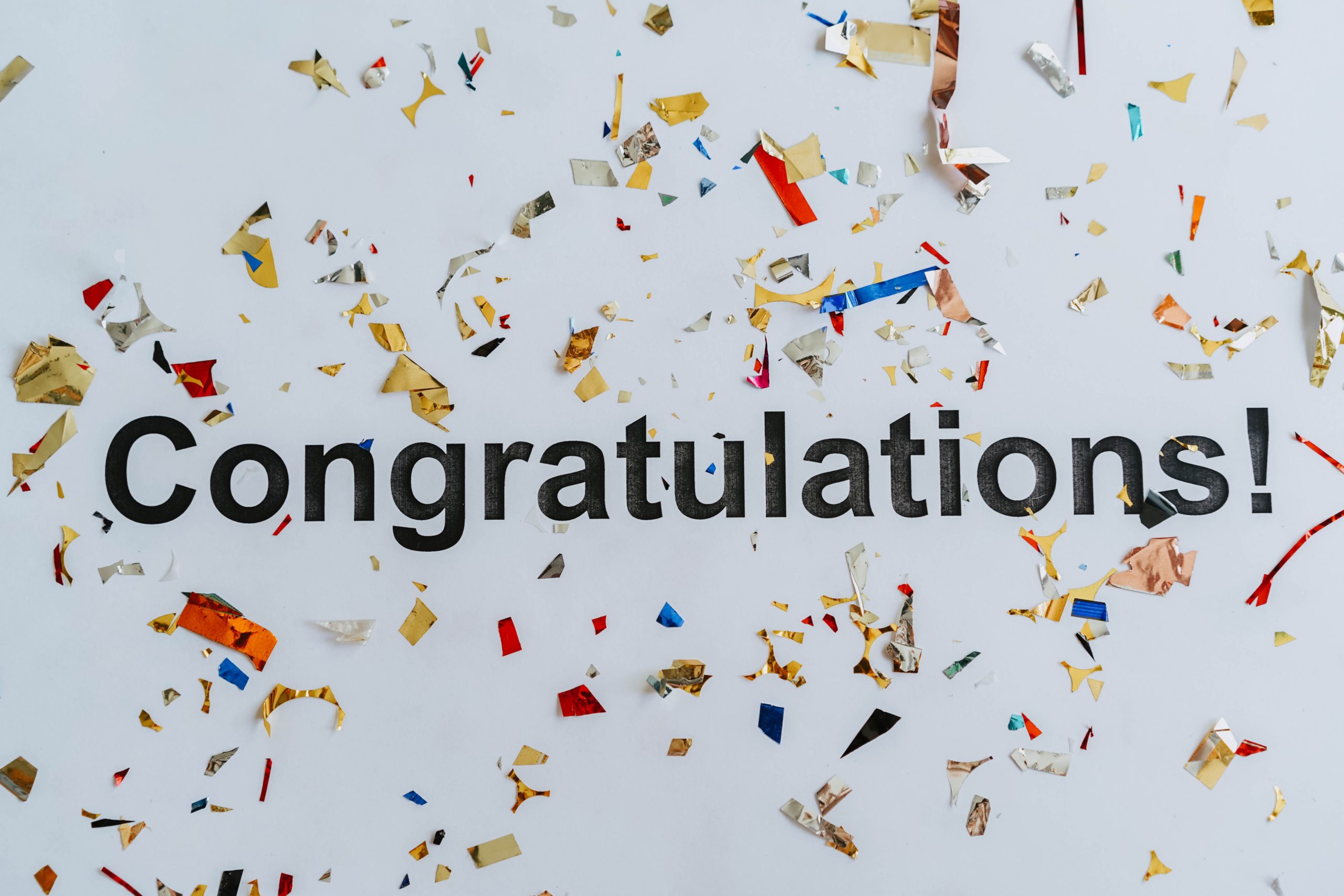 Text: Congratulations (colored confetti al around)